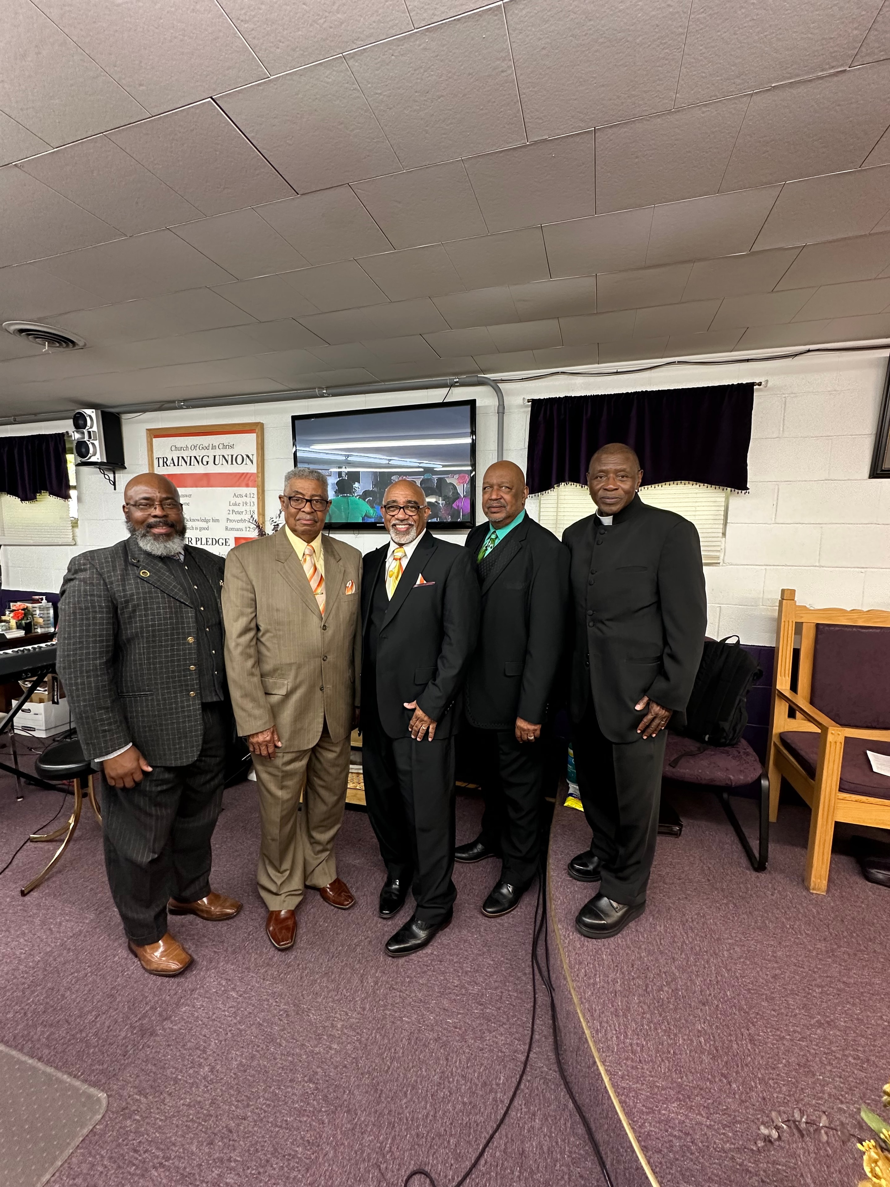 Four ministers in formal attire at House of Another Chance COGIC